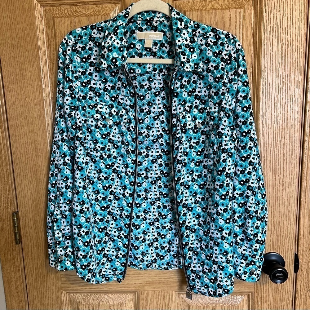 Michael Kors floral zip up top size M., long sleeves, front pockets.